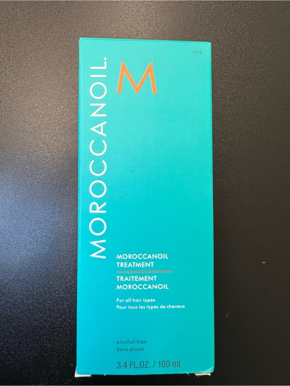 Moroccanoil Treatment - Turquoise Box with Orange Logo